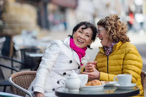 Two Friends Enjoying Coffee Together